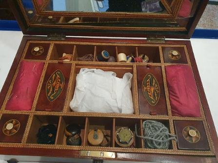 Mysterious object in an antique sewing box