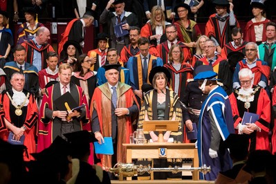 Graduation ceremony 2019 the mace bearer is placing the mace 