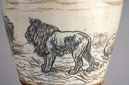 Sgraffito incised image of a lion on a vase decorated by Hannah Barlow, 1885 (detail), VG&M Collection.