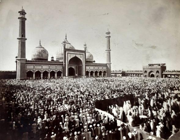 Jama Masjid with a crowd of worshippers.