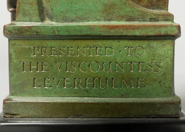 Lettering in plinth of sculpture: PRESENTED TO THE VISCOUNTESS LEVERHULM