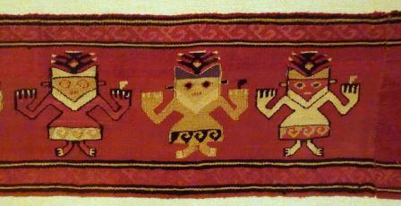 Mantle border fragment of funerary cloth with anthropomorphic feline figure