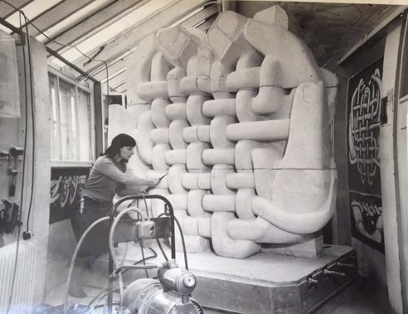 Mitzi working on the architectural sculpture Man Made Fibres c.1956 for the University of Leeds (©Estate of the Artist)