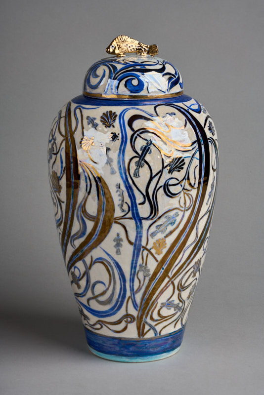 Lidded jar with sgraffito figuring and lustre glazes by Julia Carter Preston, 2001. VG&M Collection. By kind permission of the Liverpool Hope Carter Preston Foundation.