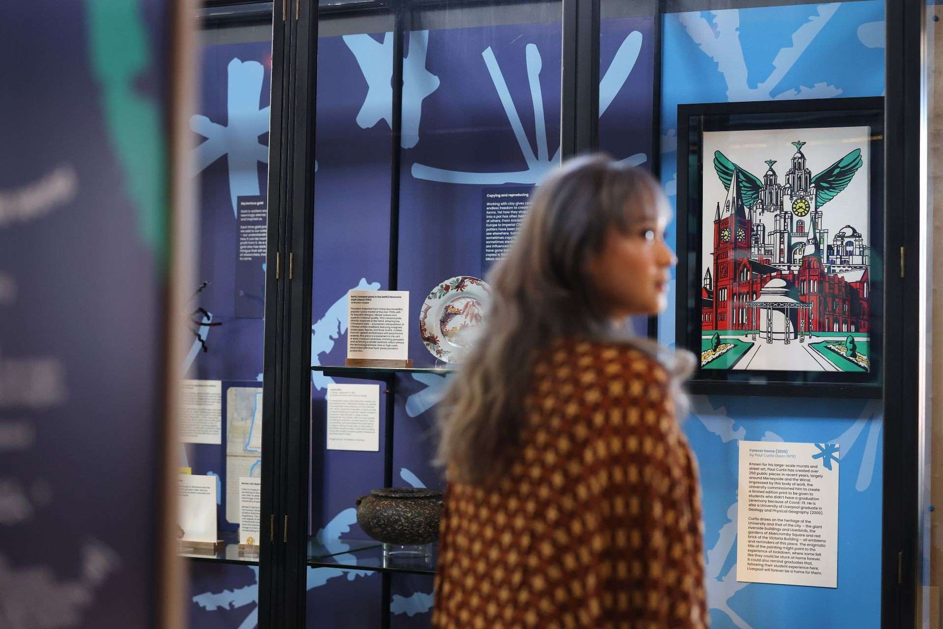 A student explores the Lightbulb moments exhibition