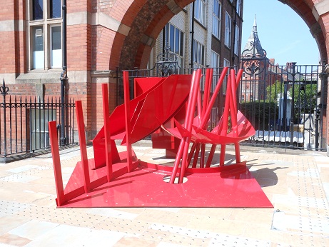 Red Between by Philip King is located in the quadrangle to the left of the Ashton Building.